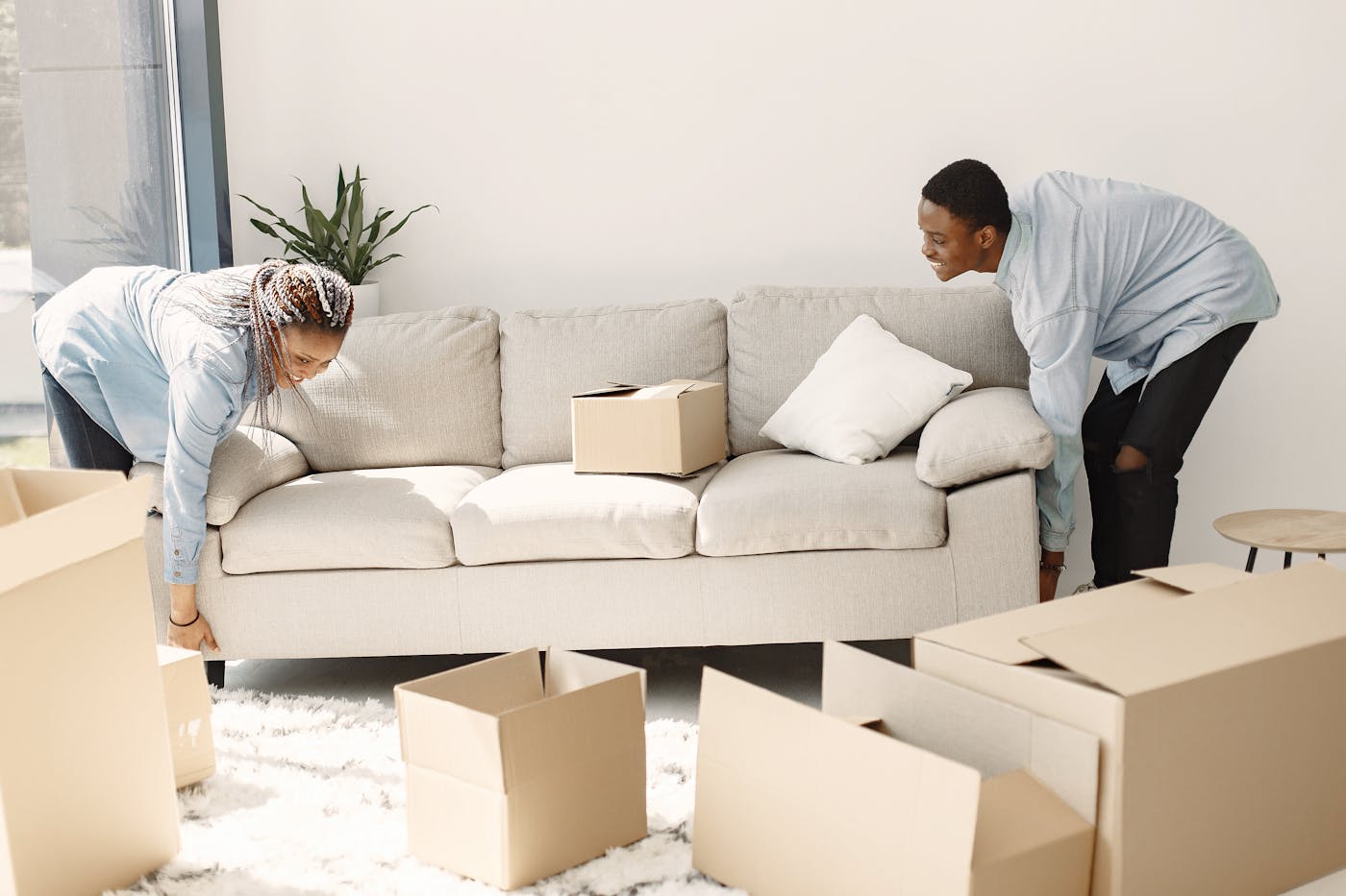 United Movers Transportation movers wrapping furniture